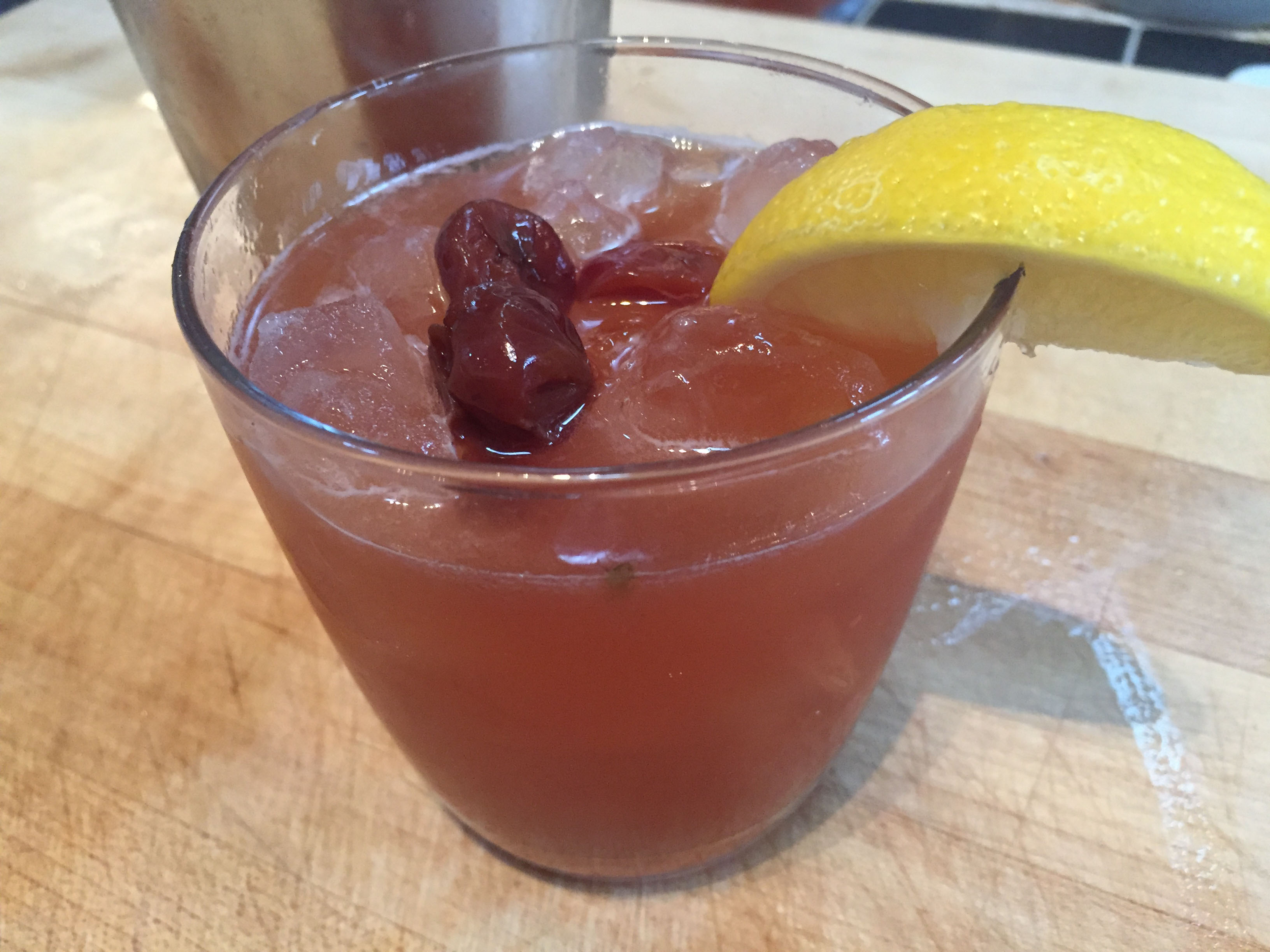 Cherry infused bourbon whiskey sour