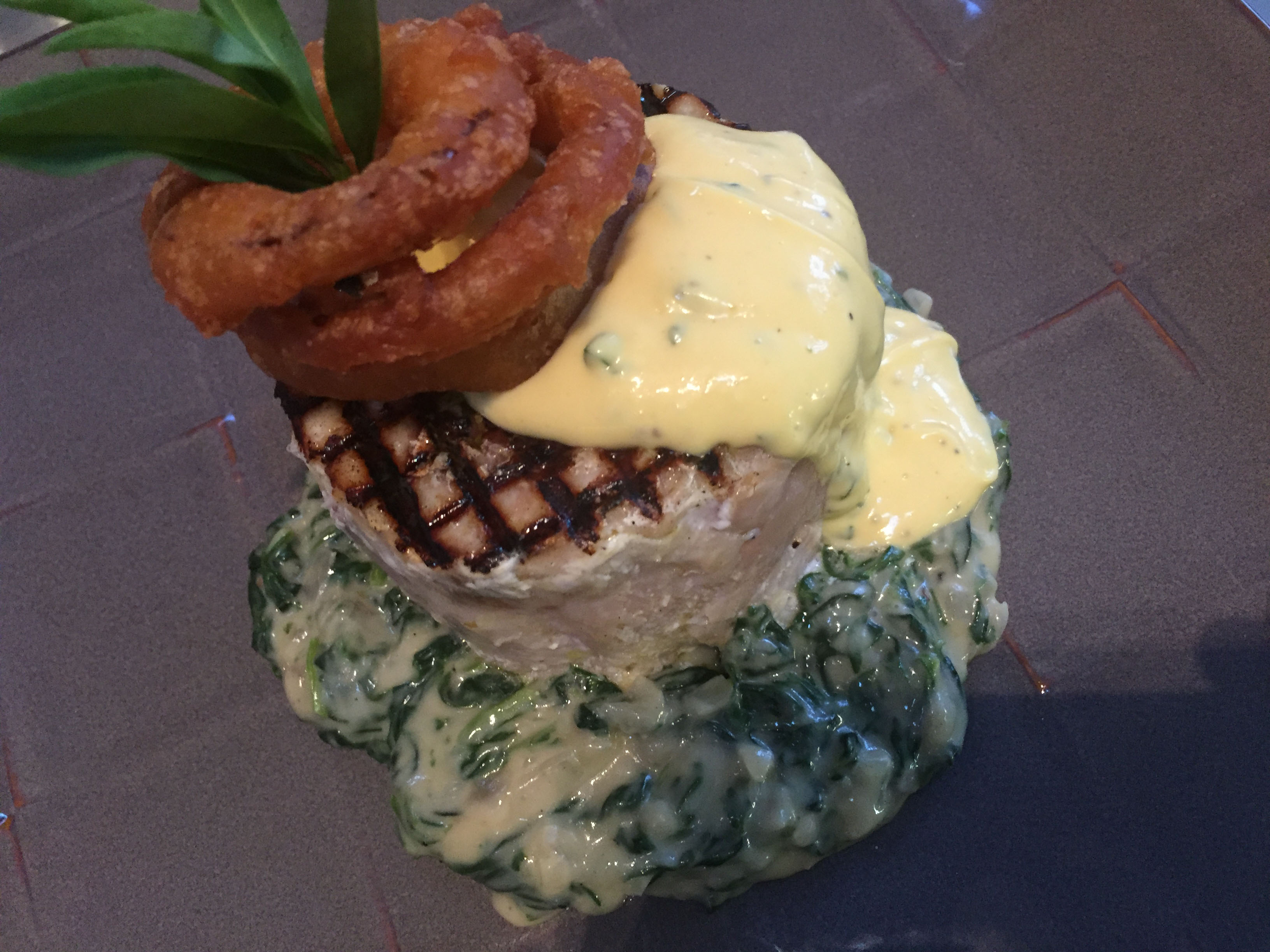 Sous vide whitefish mignon with creamed spinach and bearnaise