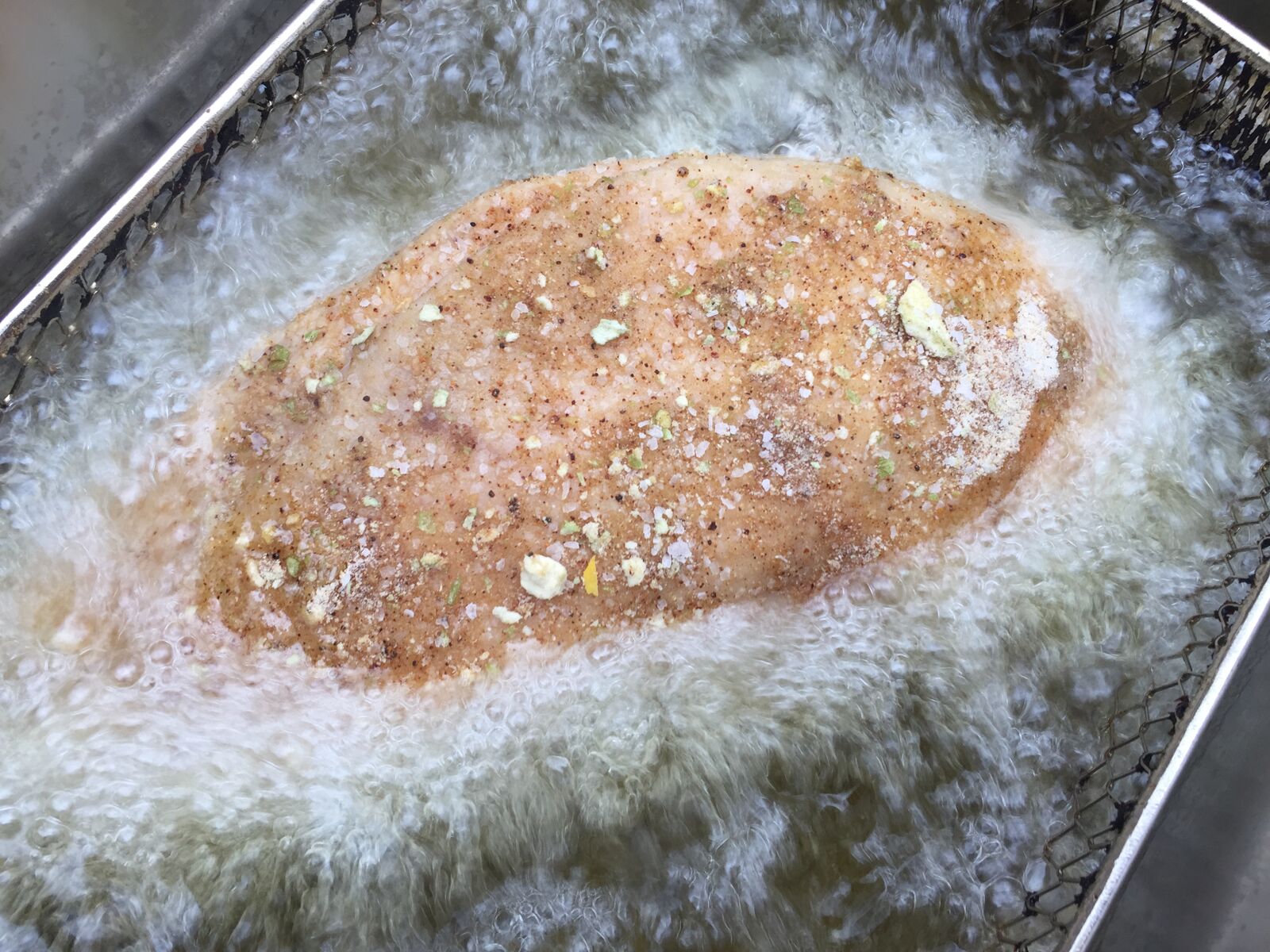 turkey going into deep fryer
