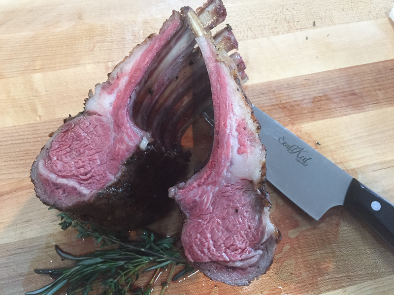 Place rack of lamb on cutting board