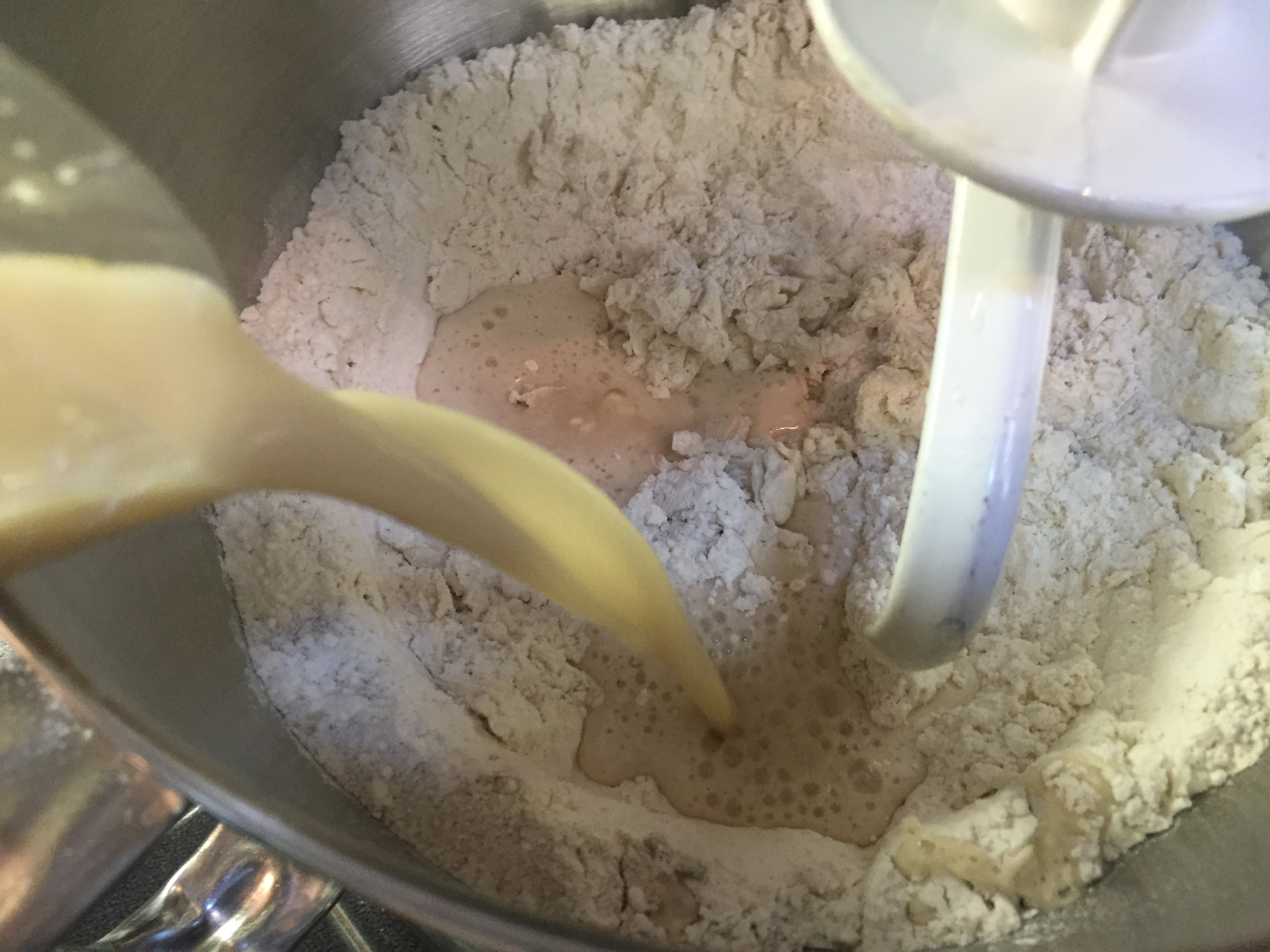 mixing pizza dough