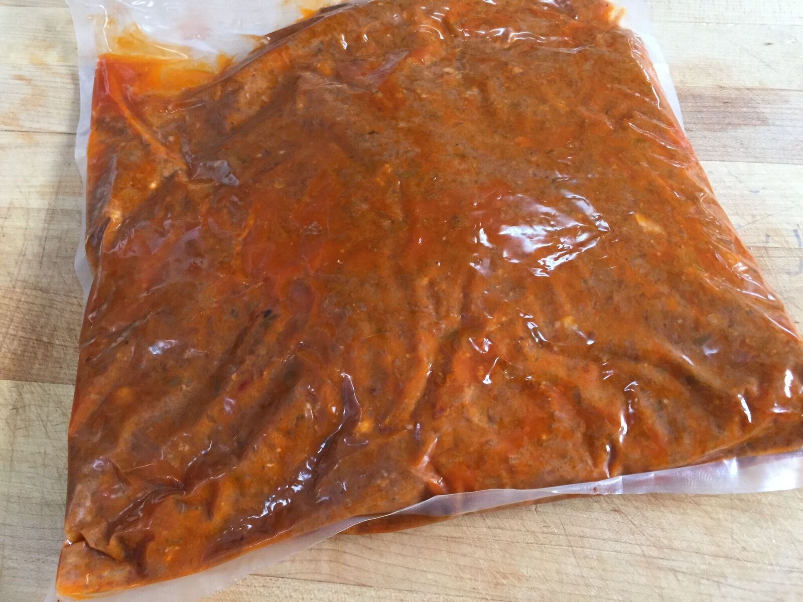 Vacuum sealed venison bolognese